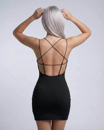 Back view of the Lauven Nova Mini Dress featuring spaghetti straps and a sleek fit.