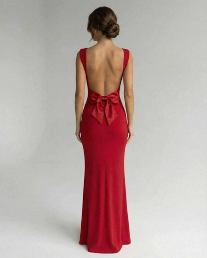 Scarlet Maxi Dress by Lauven, showcasing a sleek design with a stylish back and bow detail in vibrant red.