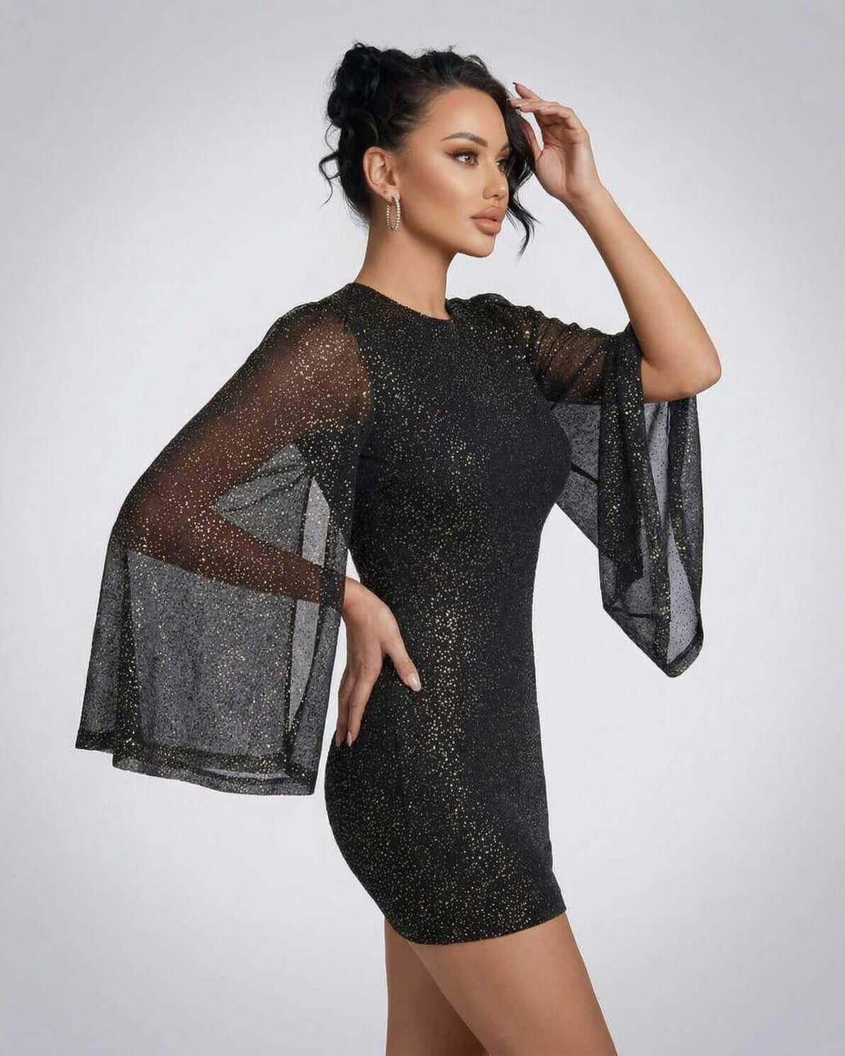 Celeste Mini Dress by Lauven featuring sheer cloak sleeves and sparkling dot pattern.