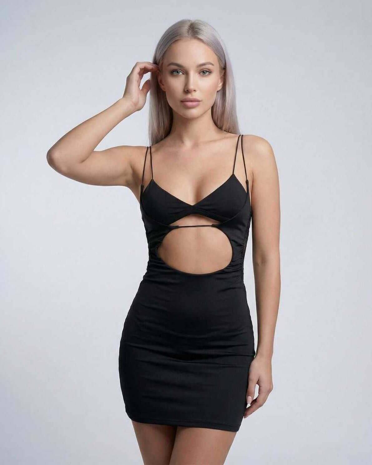 Nova Mini Dress by Lauven featuring cutout detail and spaghetti straps in black, perfect for evening wear.