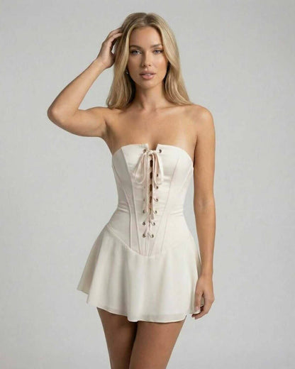 Serena Mini Dress by Lauven - Strapless ivory corset mini dress with flared skirt and lace-up front detail.
