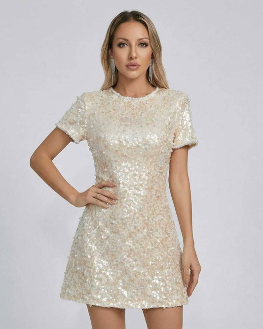 Lauven Luna Mini Dress with sequin embellishments in soft beige color, perfect for elegant occasions.