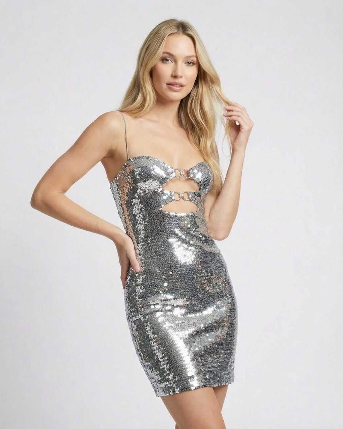 Celeste Mini Dress by Lauven featuring a silver sequin sheath silhouette and double-ring cutouts for a bold look.