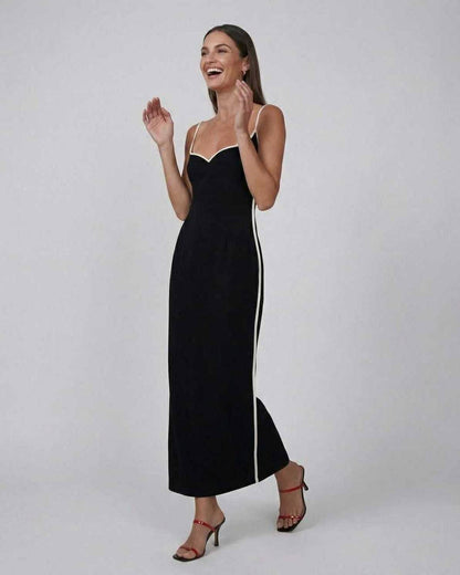 Orion Midi Dress by Lauven, sleek black dress with contrast piping, featuring a flattering slim fit silhouette.