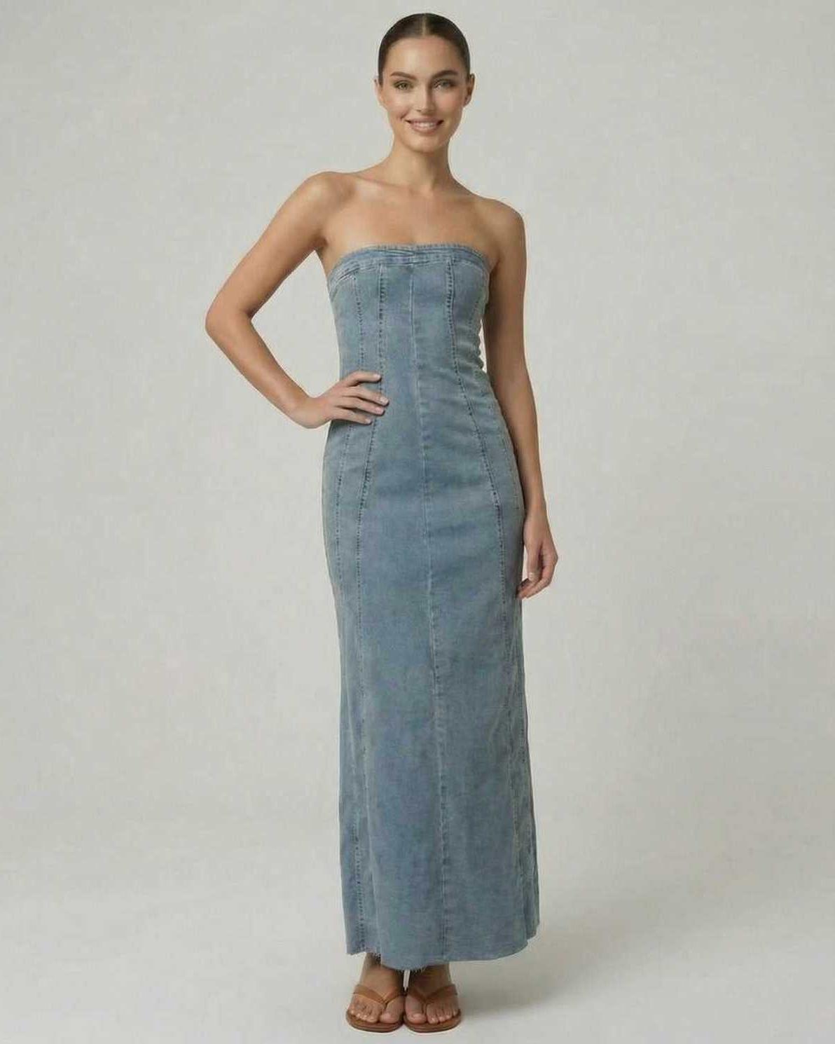 Model wearing the Dune Midi Dress by Lauven, showcasing a strapless denim-inspired trumpet silhouette.