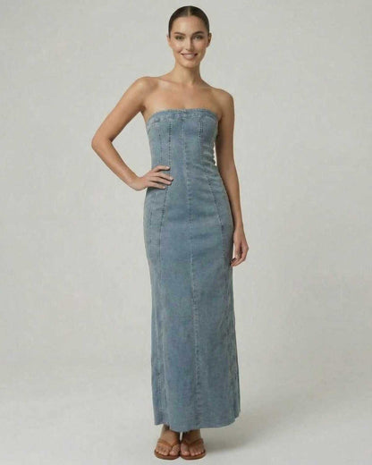 Model wearing the Dune Midi Dress by Lauven, showcasing a strapless denim-inspired trumpet silhouette.