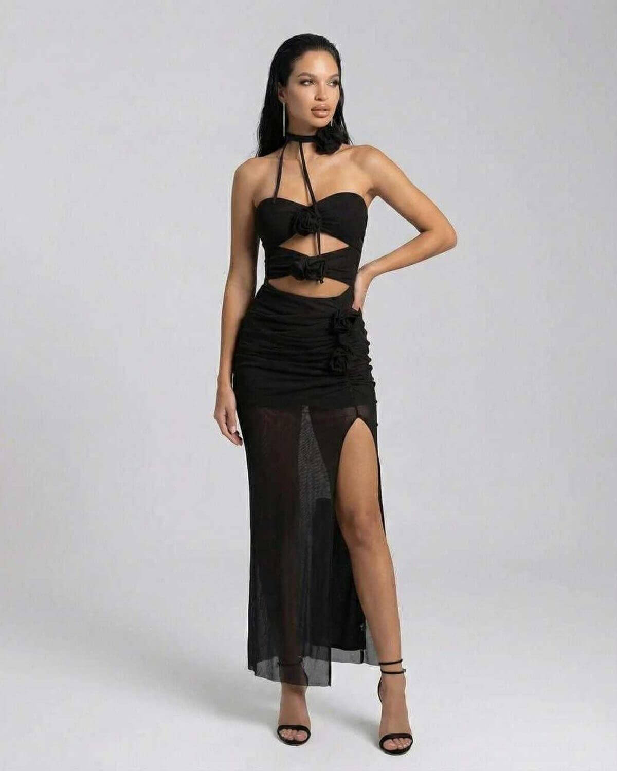 Nerina Maxi Dress by Lauven - Elegant black halter neck knitted dress with high stretch and cutout silhouette.