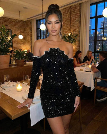 Celeste Mini Dress by Lauven, featuring a sparkling sequin design, perfect for an elegant evening out.