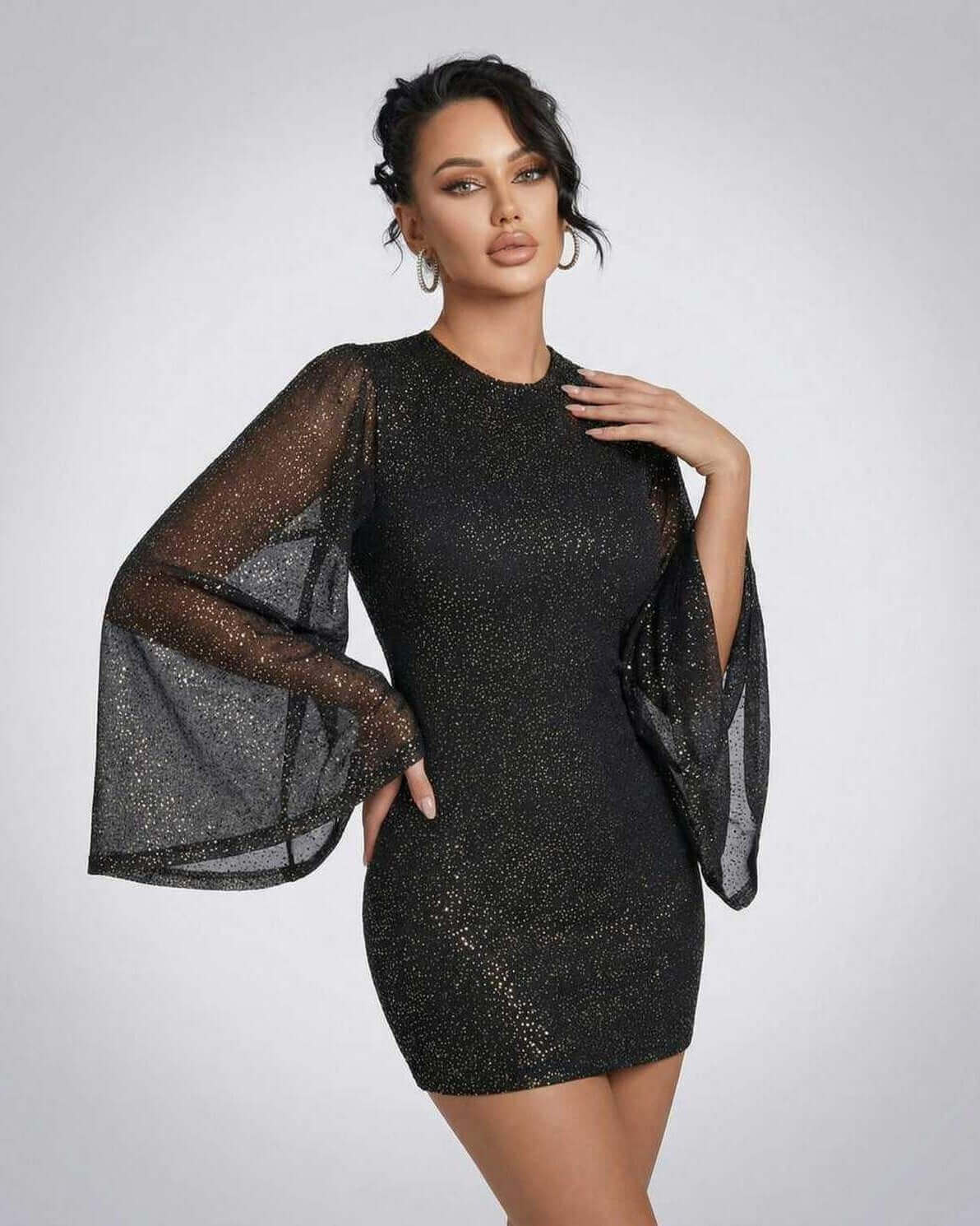 Celeste Mini Dress by Lauven featuring sheer cloak sleeves and sparkling dot pattern for an elegant look.