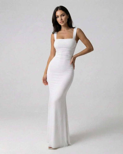 Ivory Maxi Dress by Lauven, featuring a sleek strappy back and ankle-length silhouette.