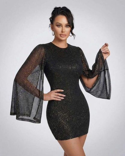 Celeste Mini Dress by Lauven featuring sheer cloak sleeves and sparkling dot pattern for an elegant look.