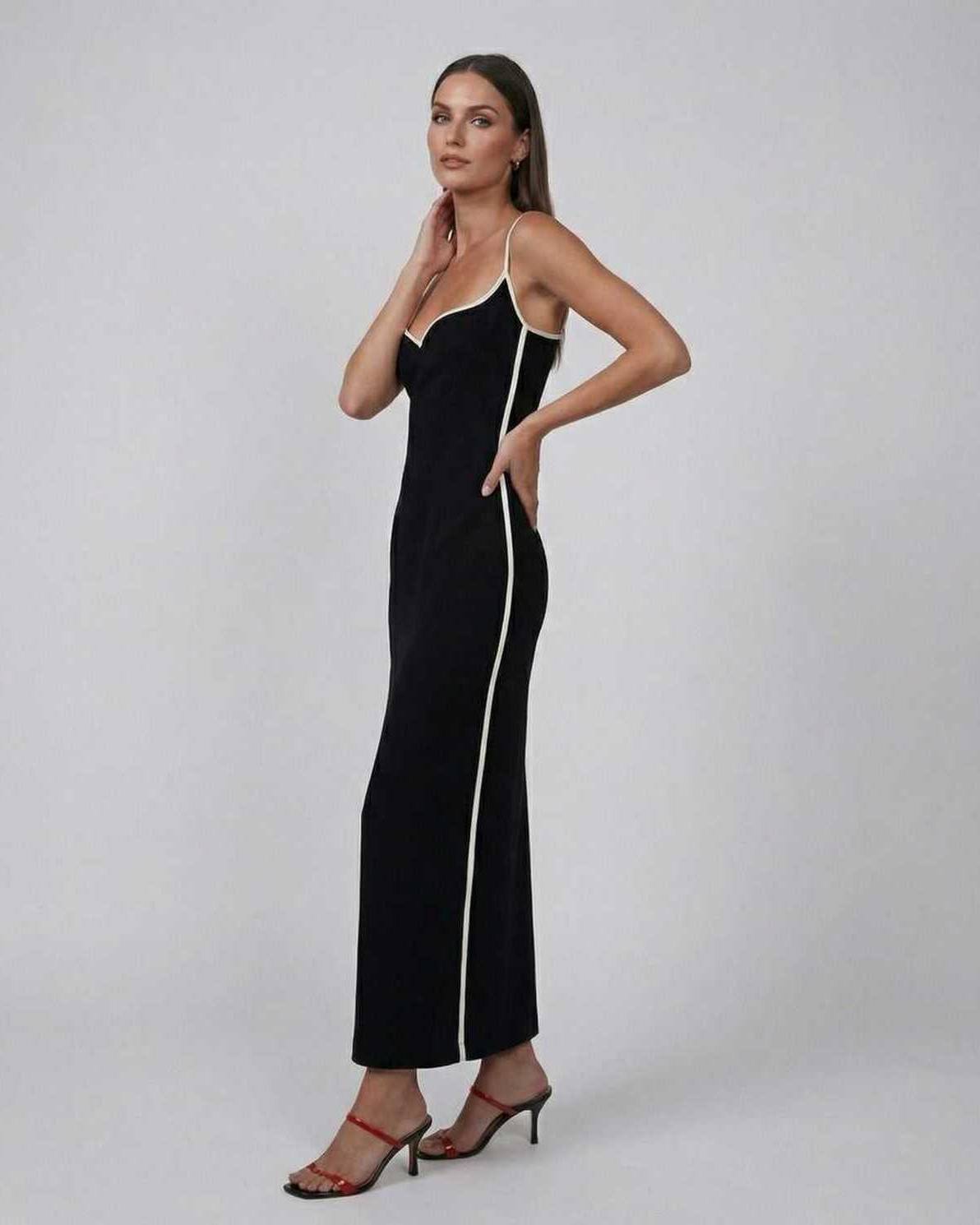 Orion Midi Dress by Lauven, featuring a sleek black slim fit design with contrast piping, perfect for modern elegance.