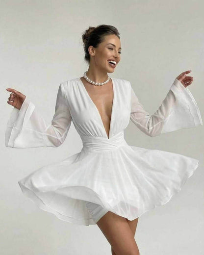 Celeste Mini Dress by Lauven features elegant V-neck and dramatic sleeves, perfect for a stylish look.