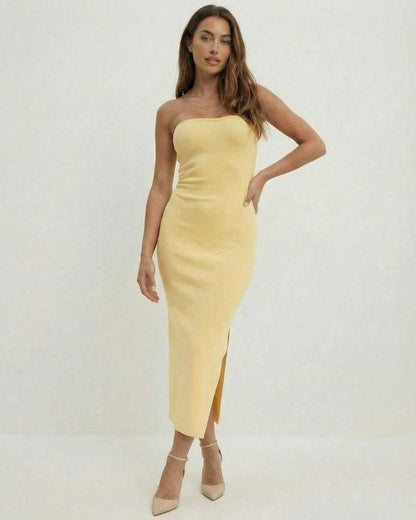 Lauven Celeste Midi Dress in soft yellow, strapless sheath with mid-calf length and side slit, perfect for Spring 2024.
