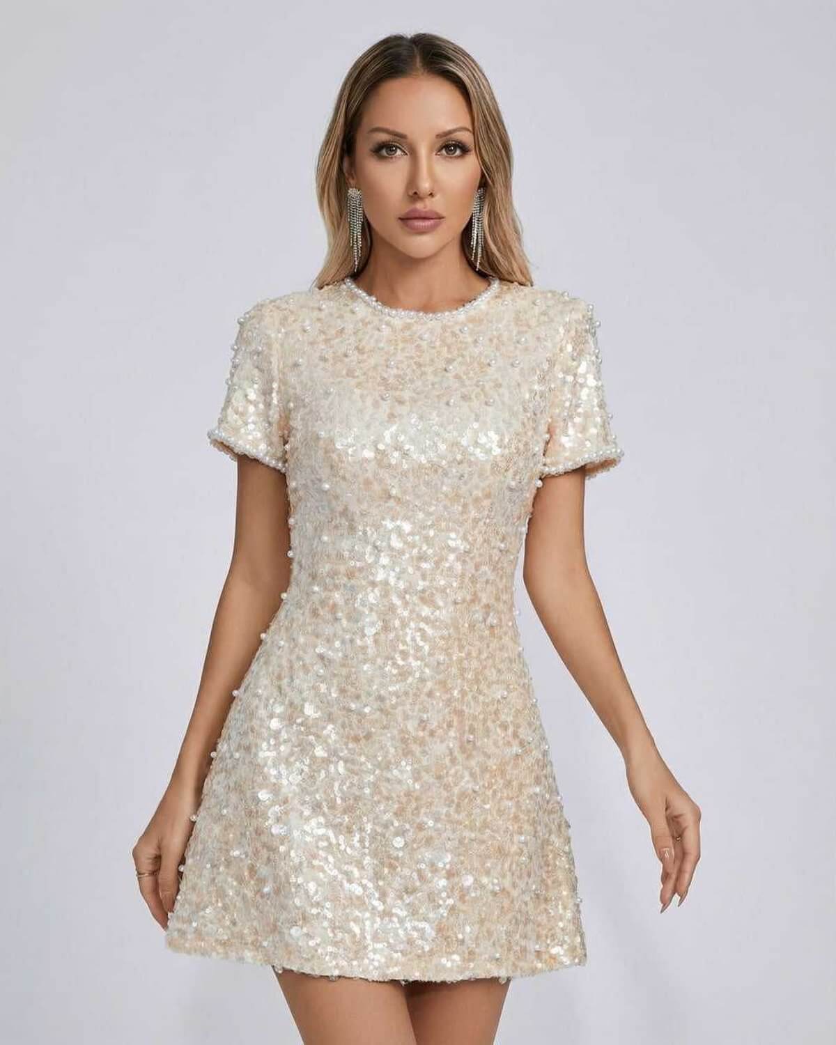 Luna Mini Dress by Lauven featuring elegant sequin embellishments in soft beige color, perfect for any occasion.