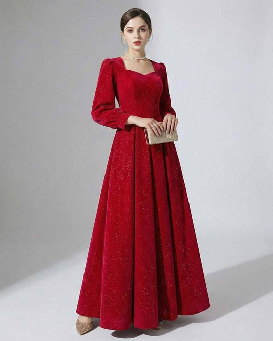 Celeste Maxi Dress by Lauven, elegant red A-line velvet gown with puff sleeves and shimmer details.