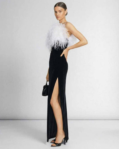 Celeste Maxi Dress by Lauven featuring a feathered halter neckline and a sleek black silhouette with a thigh-high slit.