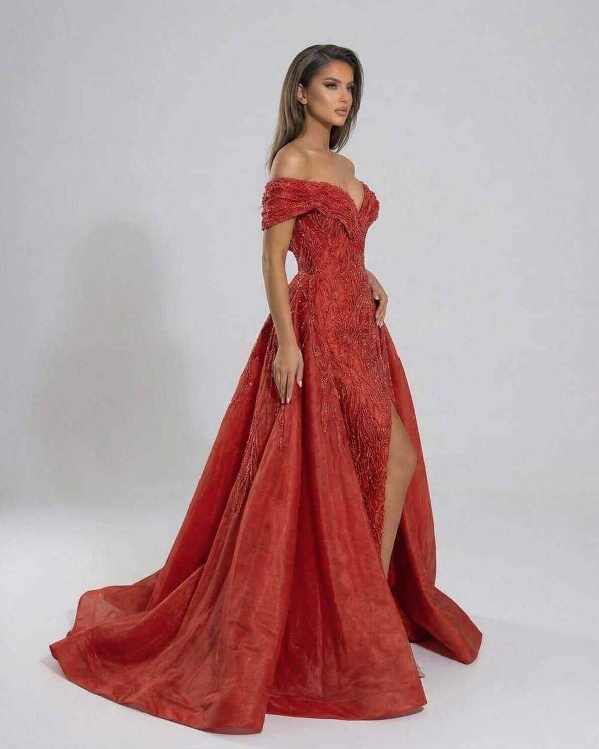 Scarlet Maxi Dress by Lauven, featuring a dramatic red sequin off-the-shoulder design and elegant A-line silhouette.
