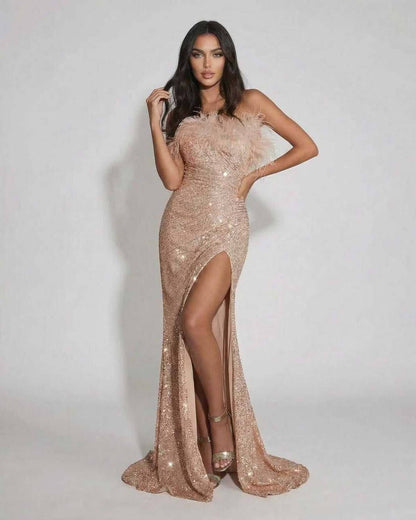 Blush Maxi Dress by Lauven, luxurious blush sequin evening gown with feather detail, off the shoulder design.