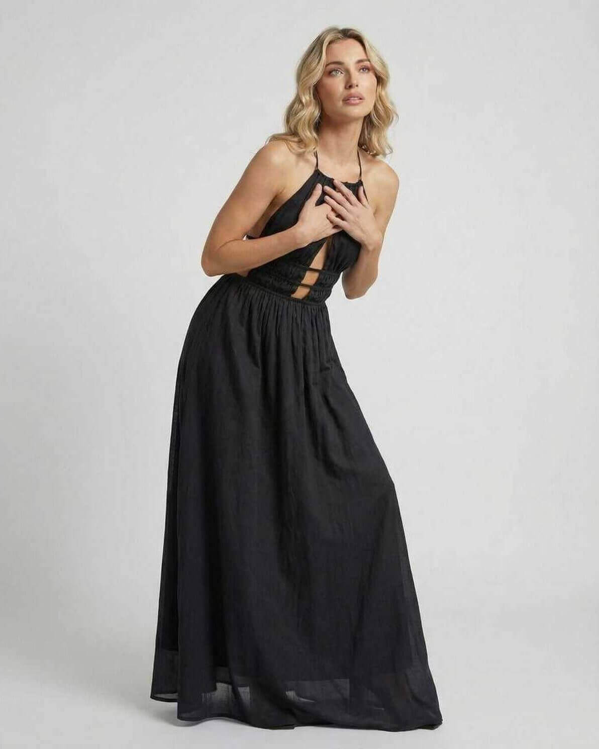 Celeste Maxi Dress by Lauven featuring an elegant halter neck and sleek black silhouette.