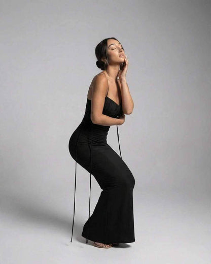 Isla Maxi Dress by Lauven featuring a black spaghetti strap sheath style, showcasing a slim fit silhouette.