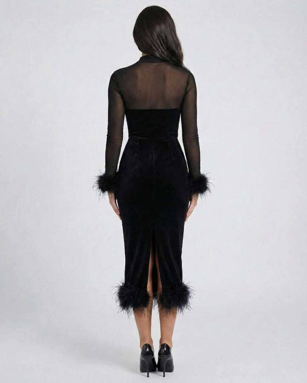 Orion Midi Dress by Lauven featuring feather trim and sheer mesh detail, showcasing back view on model.
