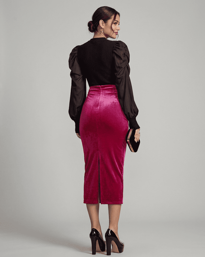 Back view of Rosalia Midi Skirt by SLIMONA, featuring a high-waisted velvet pencil design with an elegant back slit.