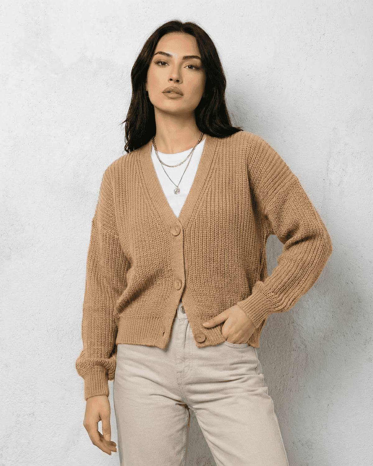 Saffron Cardigan by SLIMONA, elegant beige knitwear with relaxed V-neck and long sleeves, perfect for layering.