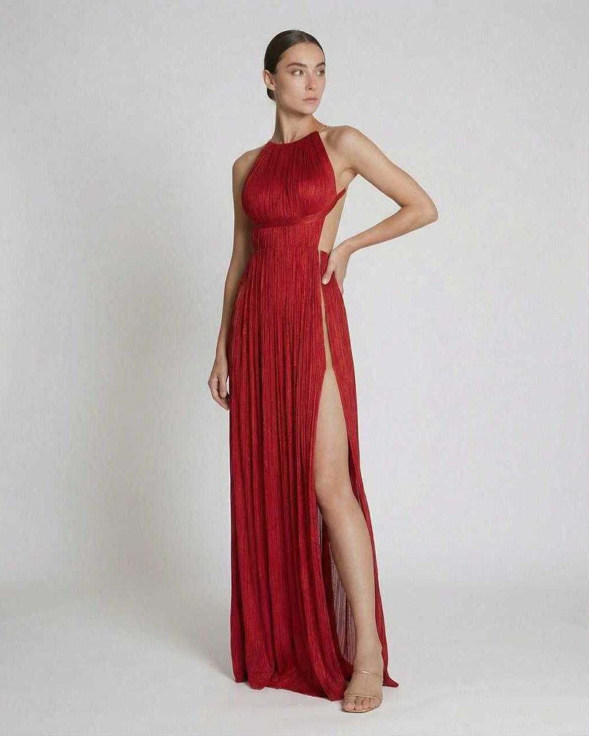 Saffron Maxi Dress by Lauven featuring pleated sheath silhouette and vibrant red halter neckline.