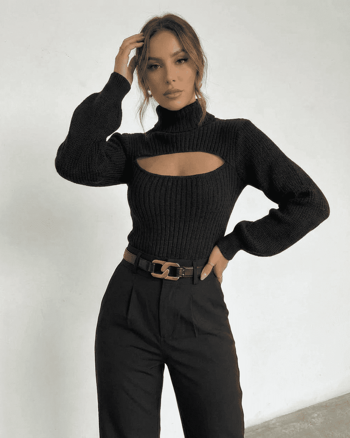 Sarina Sweater by SLIMONA - Chic black hollow out mock neck sweater showcasing modern elegance.
