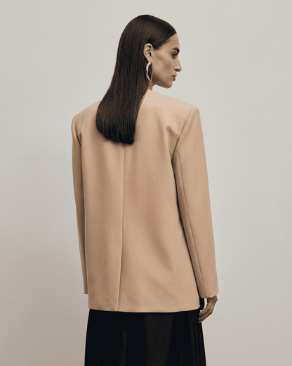 Savona Blazer by SLIMONA, showcased from the back, highlighting its tailored silhouette and modern design.