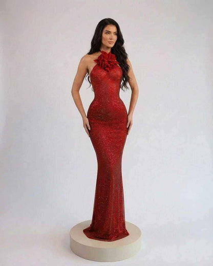 Scarlet Maxi Dress by SLIMONA featuring a halter neck and floral detail on a stunning red silhouette.