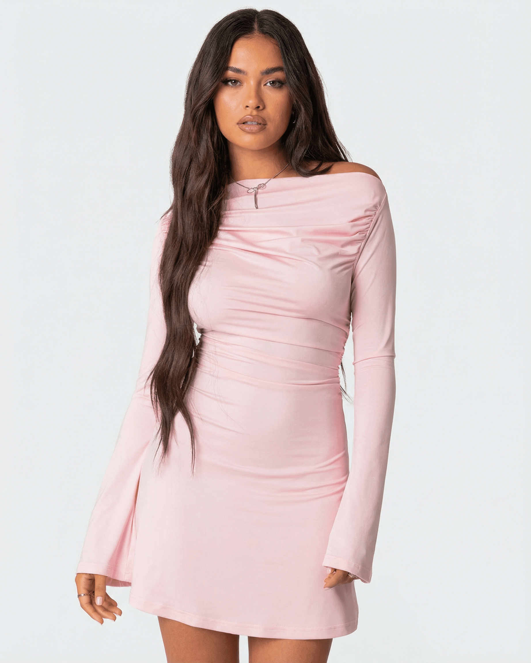 Selene Mini Dress by Lauven featuring an asymmetrical neckline and slim pencil silhouette in soft pink.