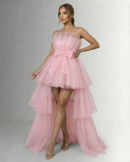 Seraphina Maxi Dress by Lauven - Elegant strapless pink tulle gown with high-low hemline and bow detail.