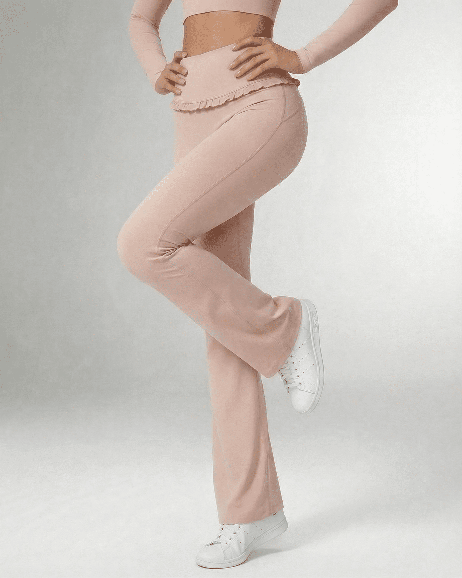 Serena Leggings by SLIMONA - Elegant flare pants in soft pink with pockets and stylish ruffled waistband.
