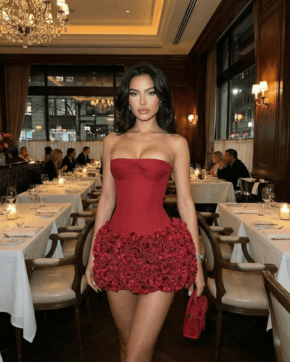 Siena Mini Dress by SLIMONA featuring a strapless corset silhouette and textured mini skirt in rich red.