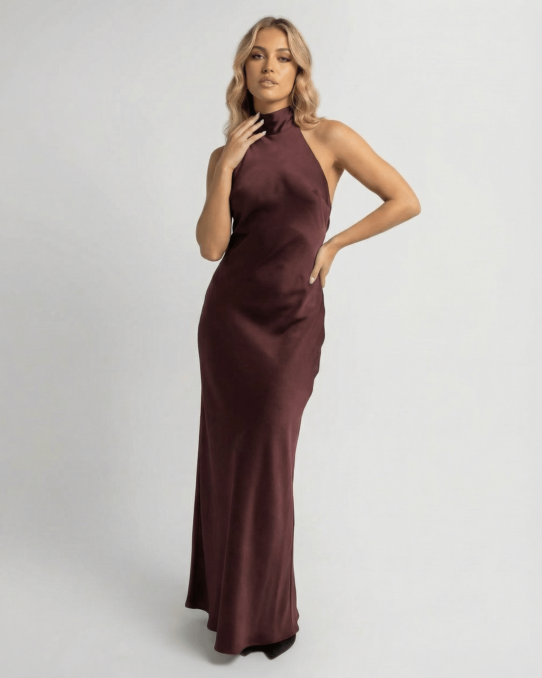 Sienna Maxi Dress by Lauven, a burgundy satin halter dress with a sleek sheath silhouette, perfect for modern style.