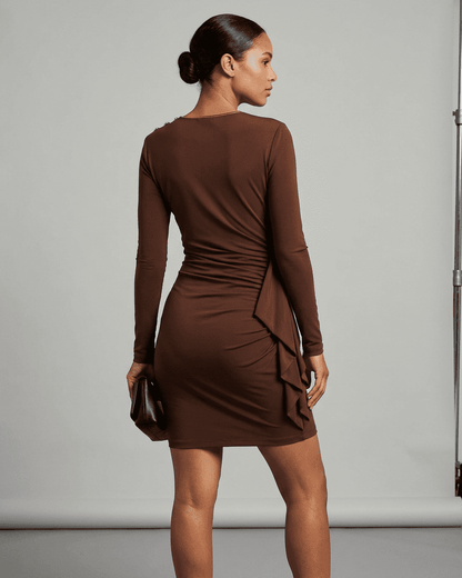 Sienna Mini Dress by SLIMONA, showcasing a fitted bodycon style with ruched detailing in a rich brown color.