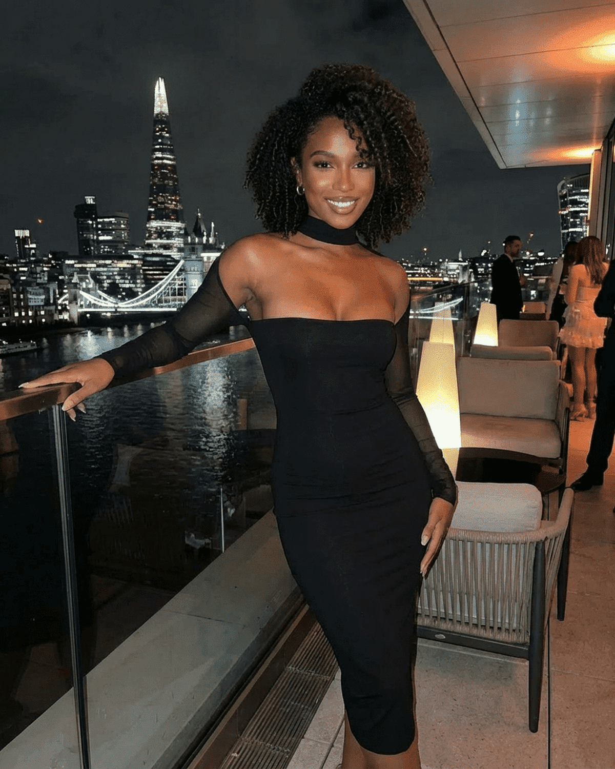 Arden Midi Dress by SLIMONA, a chic black bodycon dress for a stunning night out.