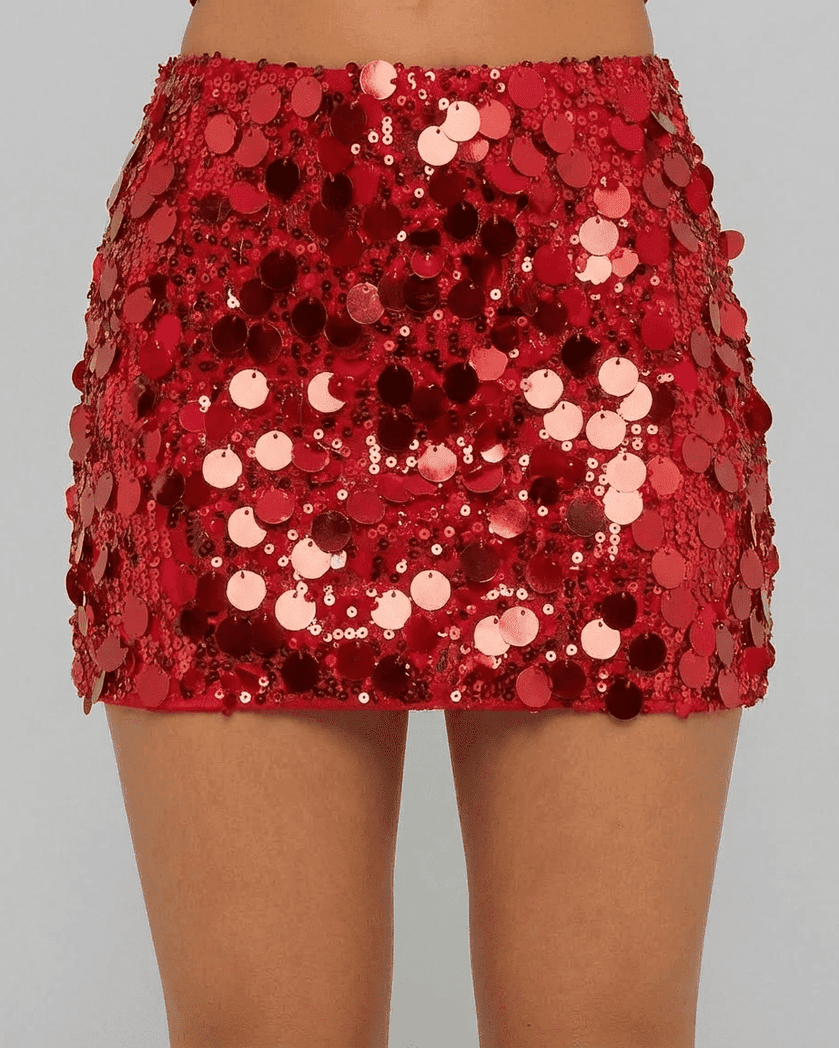 Flamenco Mini Skirt by SLIMONA featuring a dazzling red sequin finish and stylish A-line bodycon silhouette.