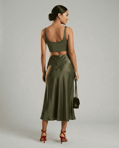 Olivia Midi Skirt from SLIMONA showcasing an elegant olive satin mermaid skirt paired with a stylish crop top.