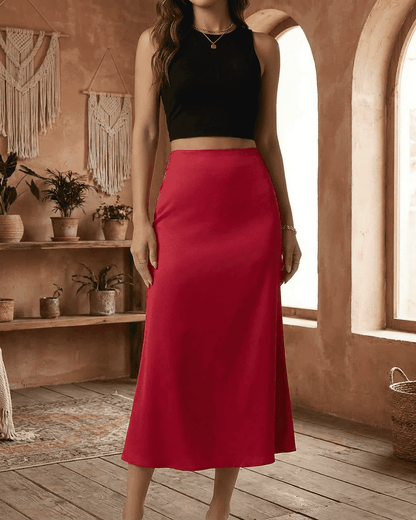 Rosalia Midi Skirt by SLIMONA – elegant satin mermaid midi skirt in rich red, creating fluid silhouette.
