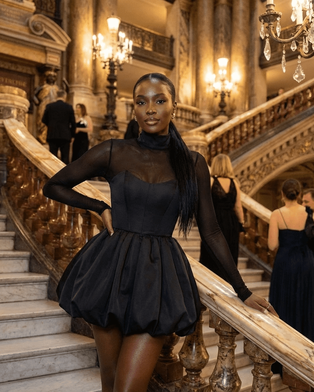 Selene Mini Dress by SLIMONA, featuring a bubble hem design and sheer mesh upper for an elegant silhouette.