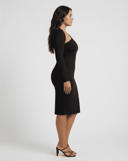 Vega Midi Dress by SLIMONA, showcasing a stylish one-shoulder bodycon fit from the side perspective.
