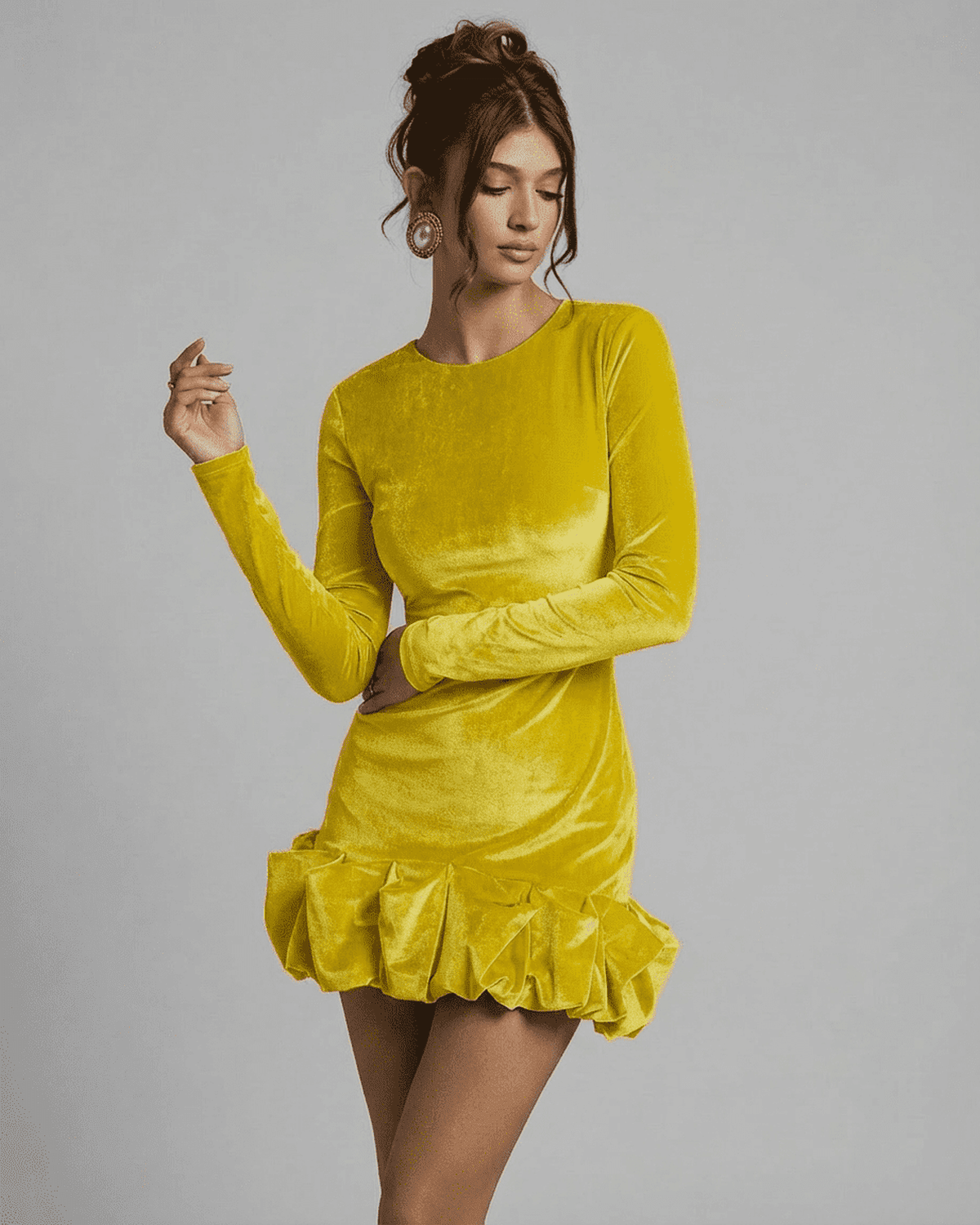 Velora Mini Yellow dress by SLIMONA, showcasing luxe velvet with pleated hem and bodycon silhouette.