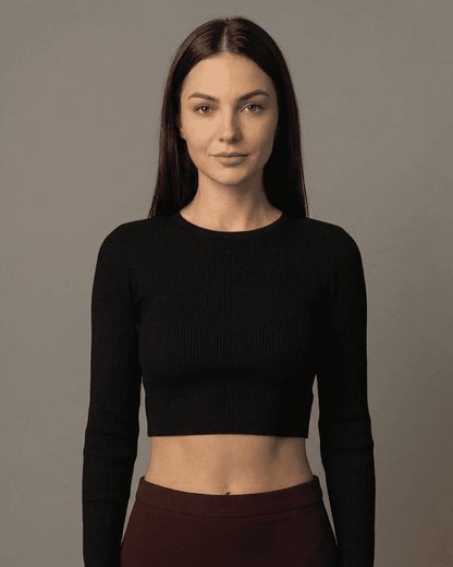 Merlot Maxi Skirt model wearing a stylish black crop top, showcasing modern elegance and a polished look.