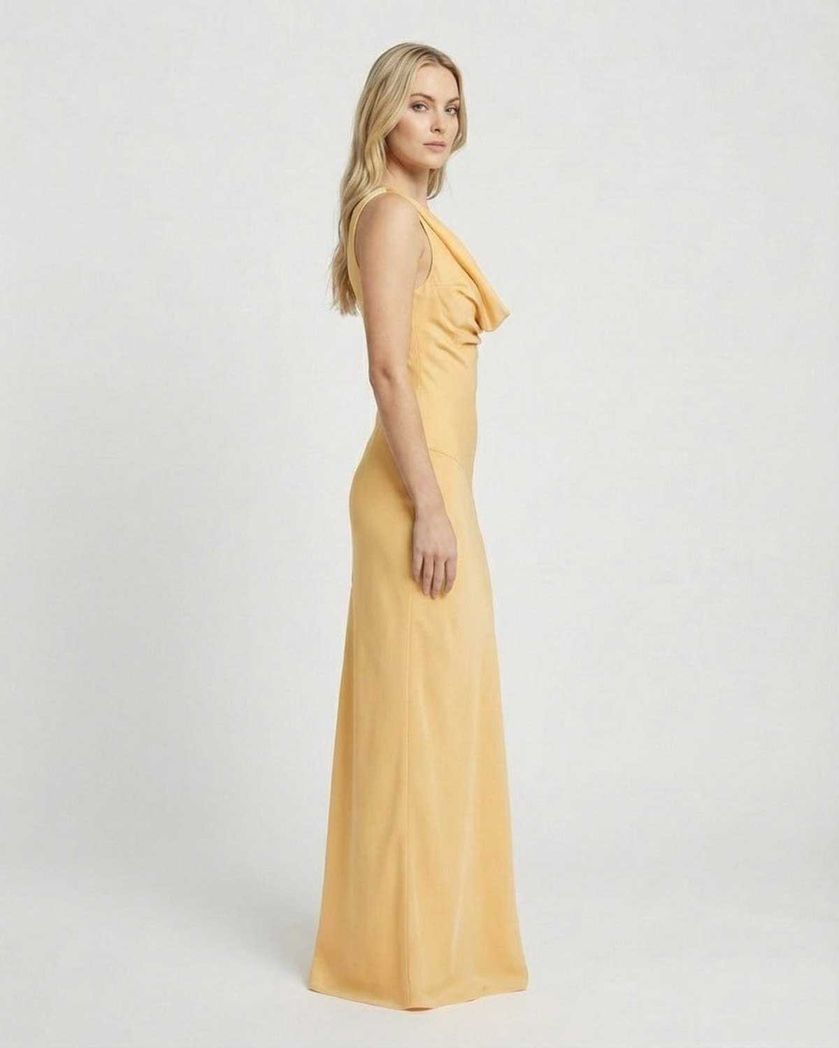 Solara Maxi Dress by SLIMONA, showcasing a satin-effect cowl neck and bodycon silhouette in a soft yellow tone.