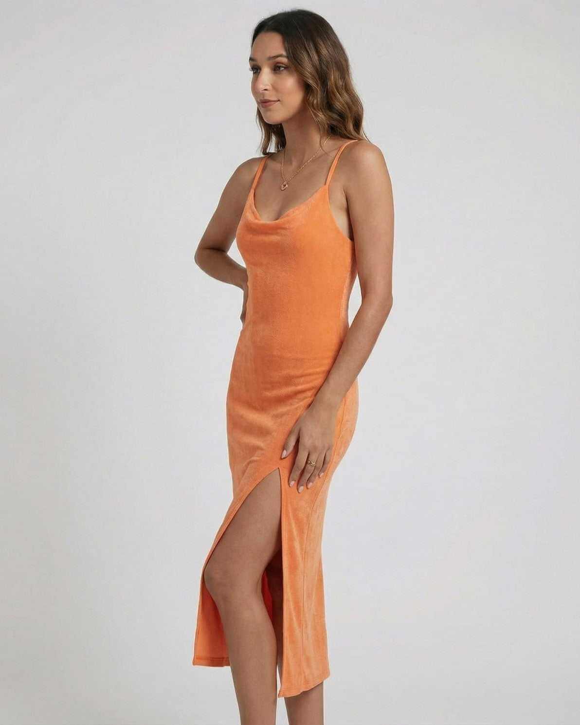 Solara Midi Dress by Lauven, featuring a cowl neck and elegant slit, perfect for elevated evenings.