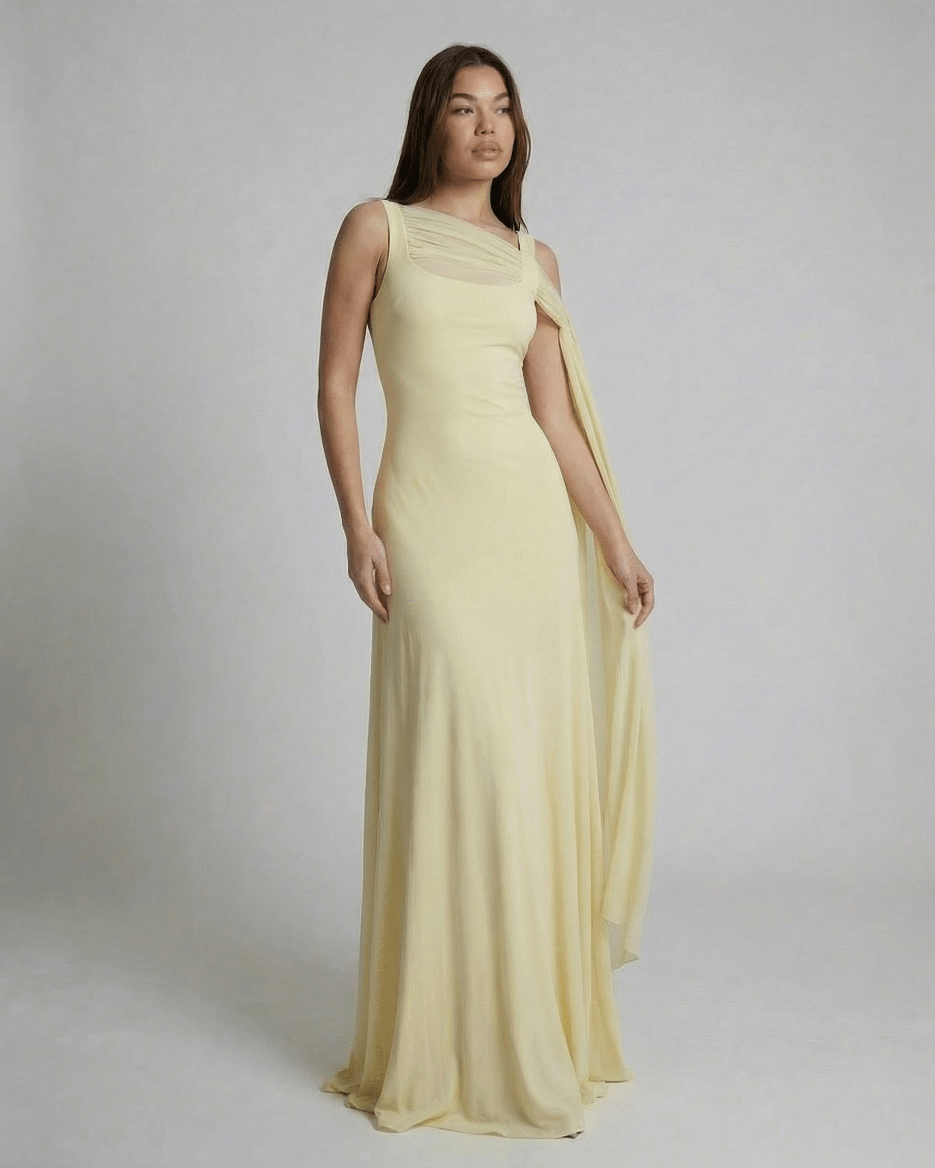 Solenne Maxi Dress by SLIMONA - Elegant light yellow slip dress with square neck and mesh shawl detail.