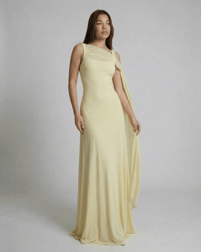 Solenne Maxi Dress by SLIMONA - Elegant light yellow slip dress with square neck and mesh shawl detail.